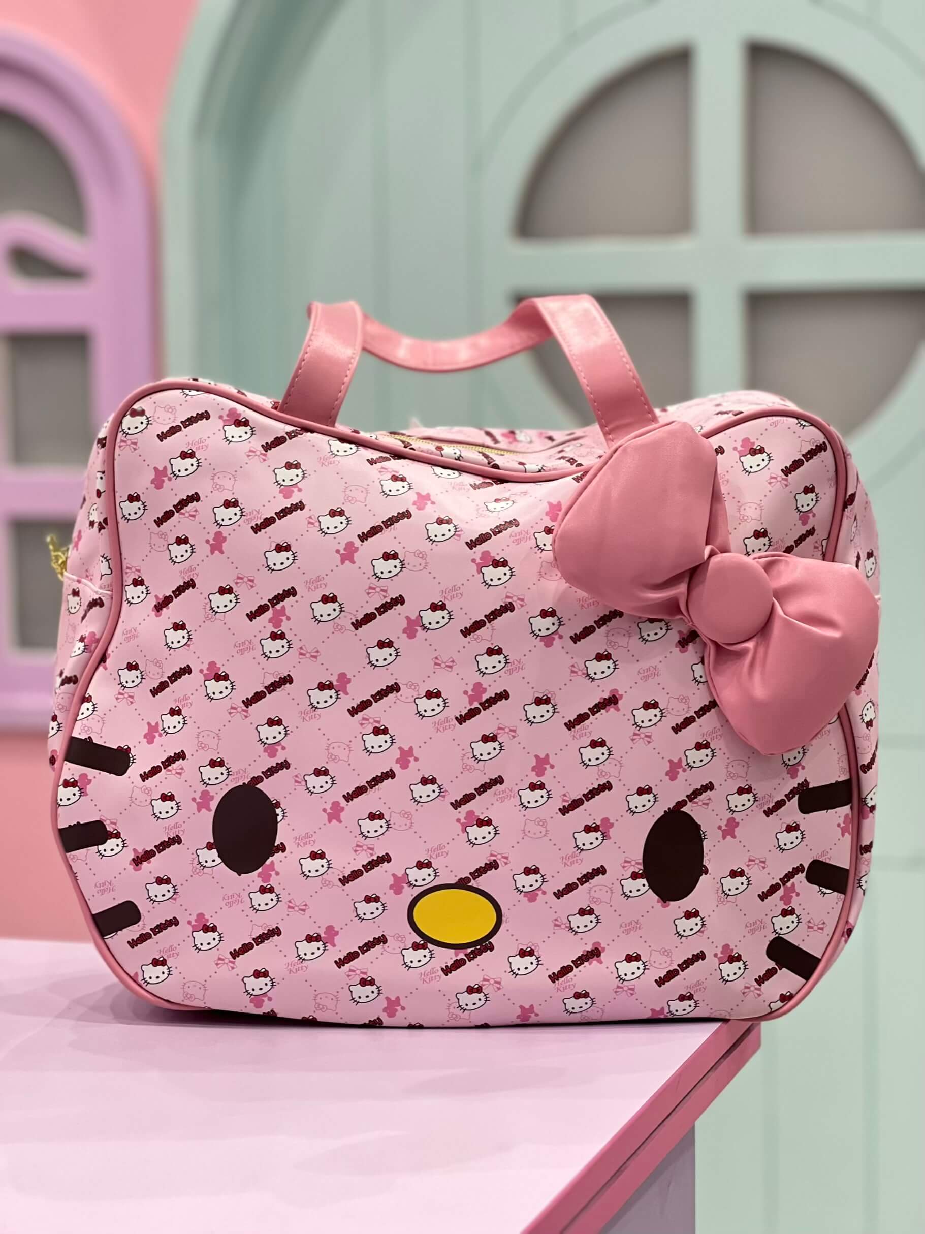 ساک کیتی مسافرتی صورتی سر پاپیونی