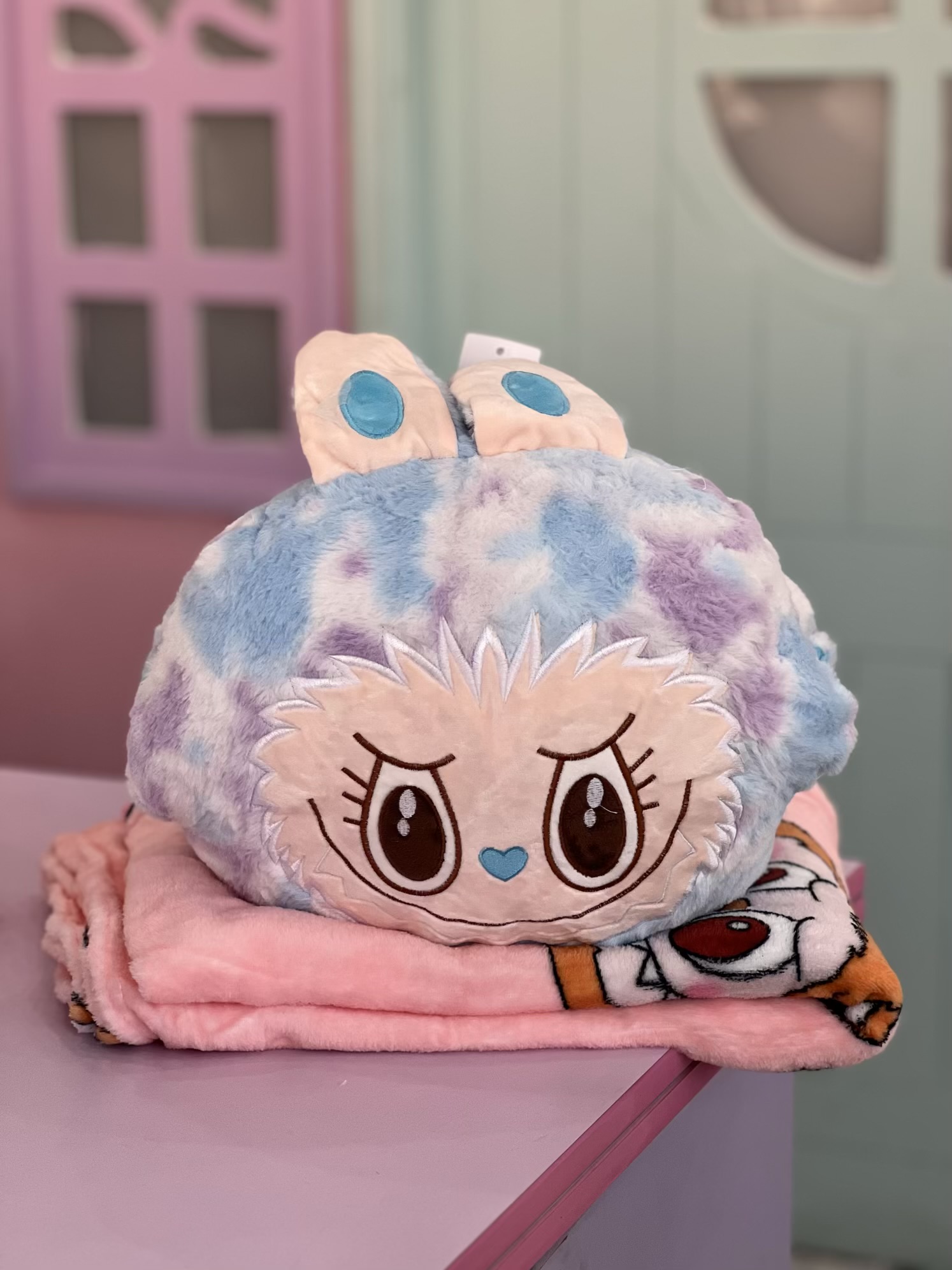 پتوبالشتی لبوبو آبرنگی کوله‌ای